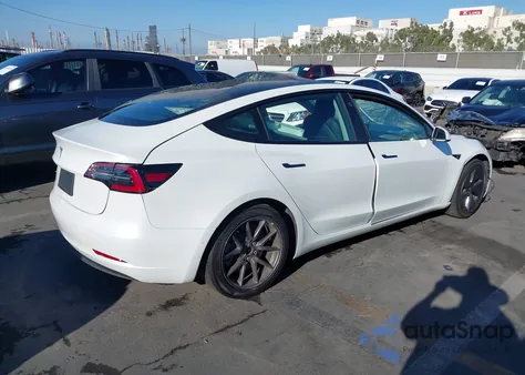 2021 Tesla Model 3 Standard Range Plus Rear-Wheel Drive from USA, damaged, VIN 5YJ3E1EA9MF868429